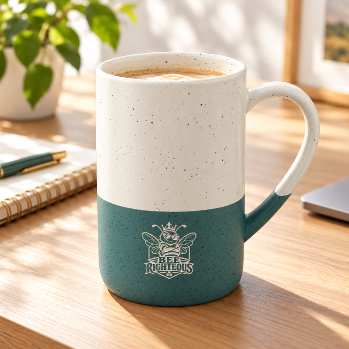 Promotional lifestyle styling for speckled two-tone forest-green ceramic coffee mug
