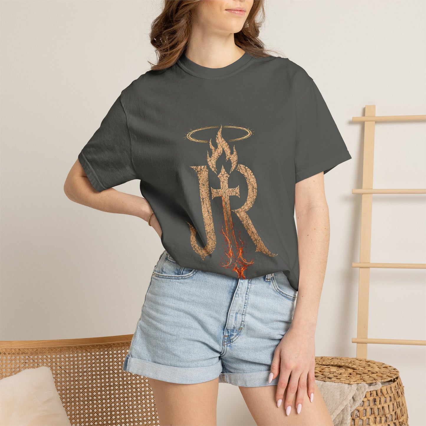 Person wearing a gray t-shirt with 'Happy Father's Day' text and floral design.