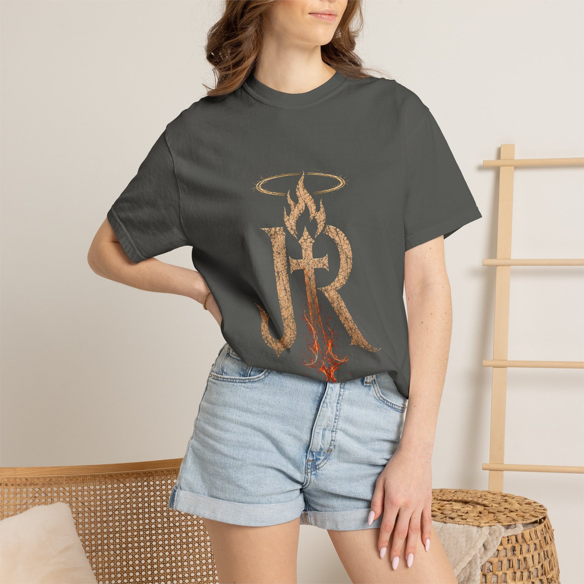 Person wearing a gray t-shirt with 'Happy Father's Day' text and floral design.
