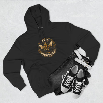 Black hoodie with a tree-of-life design, black jeans, and black sneakers on a light gray background