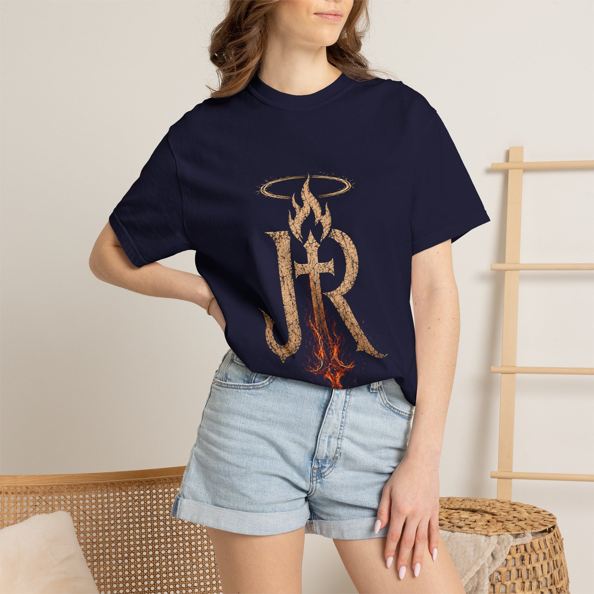 Person wearing a navy blue t-shirt with a unique design, standing against a neutral background.