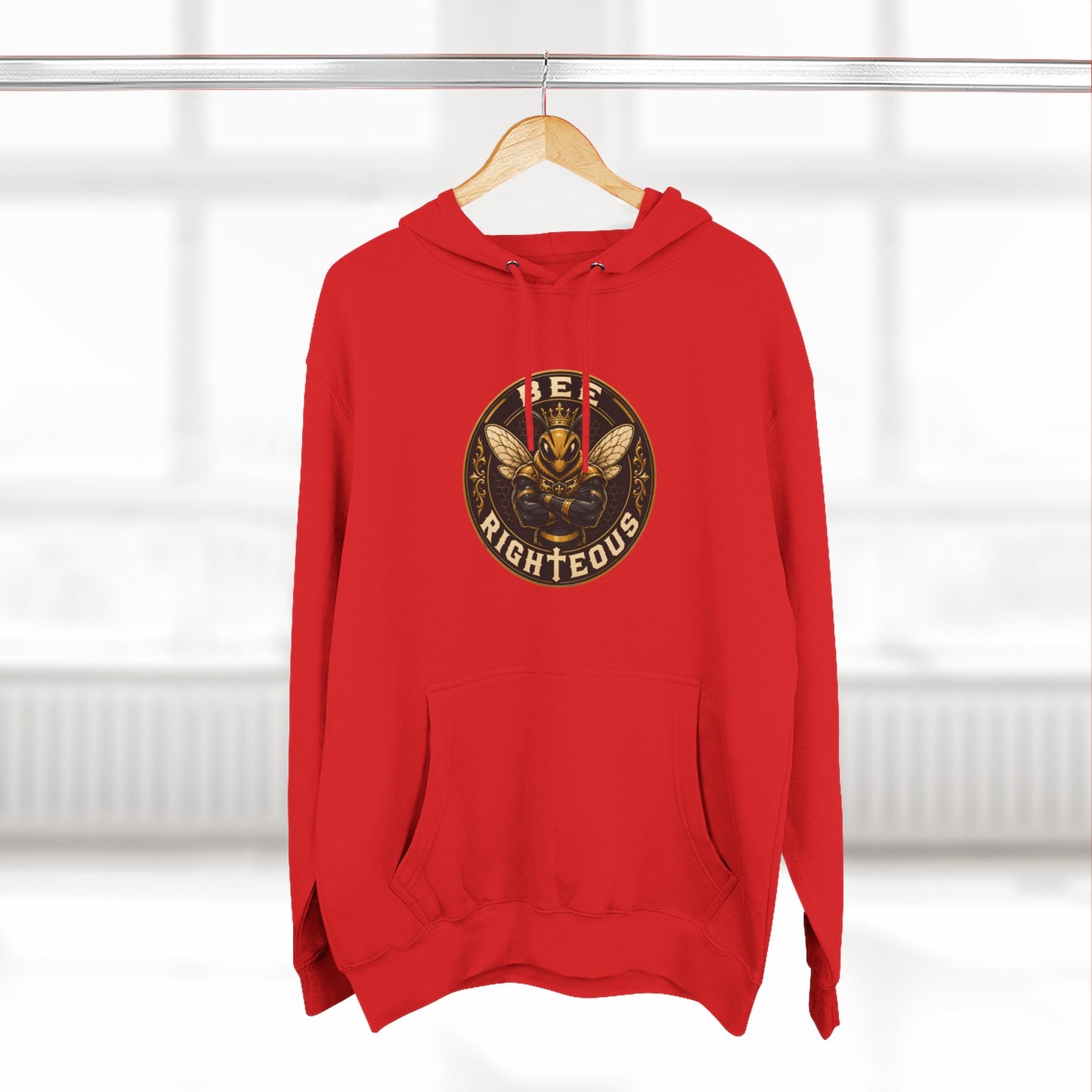 Red hoodie with a logo on a hanger against a white background
