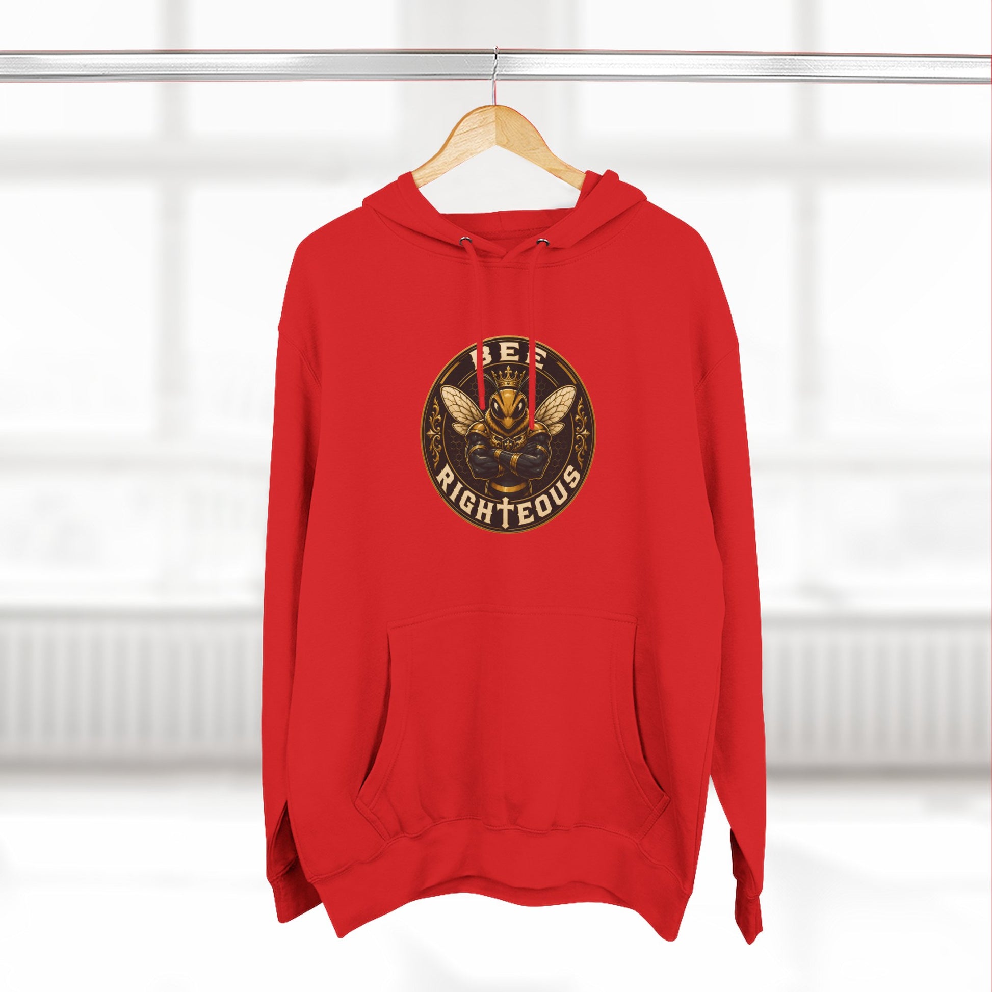 Red hoodie with a logo on a hanger against a white background
