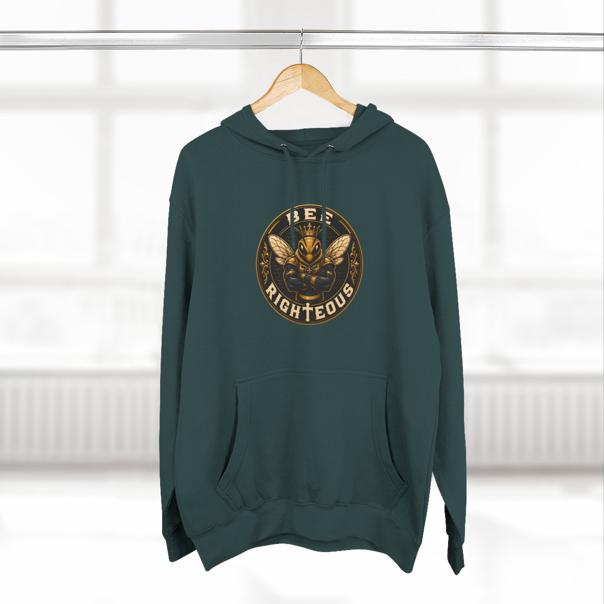 Green hoodie with text and logo on a hanger against a white background