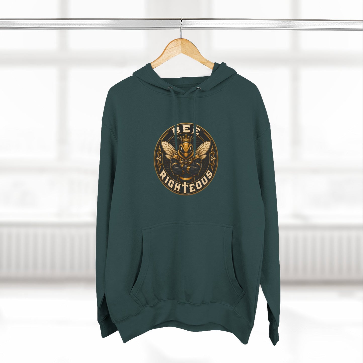 Green hoodie with text and logo on a hanger against a white background