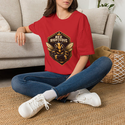 Person wearing a red t-shirt with a bee graphic and 'Bee Righteous' text, sitting on the floor.