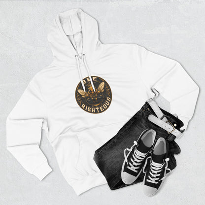 White hoodie with a logo, black jeans, and black sneakers on a light gray background