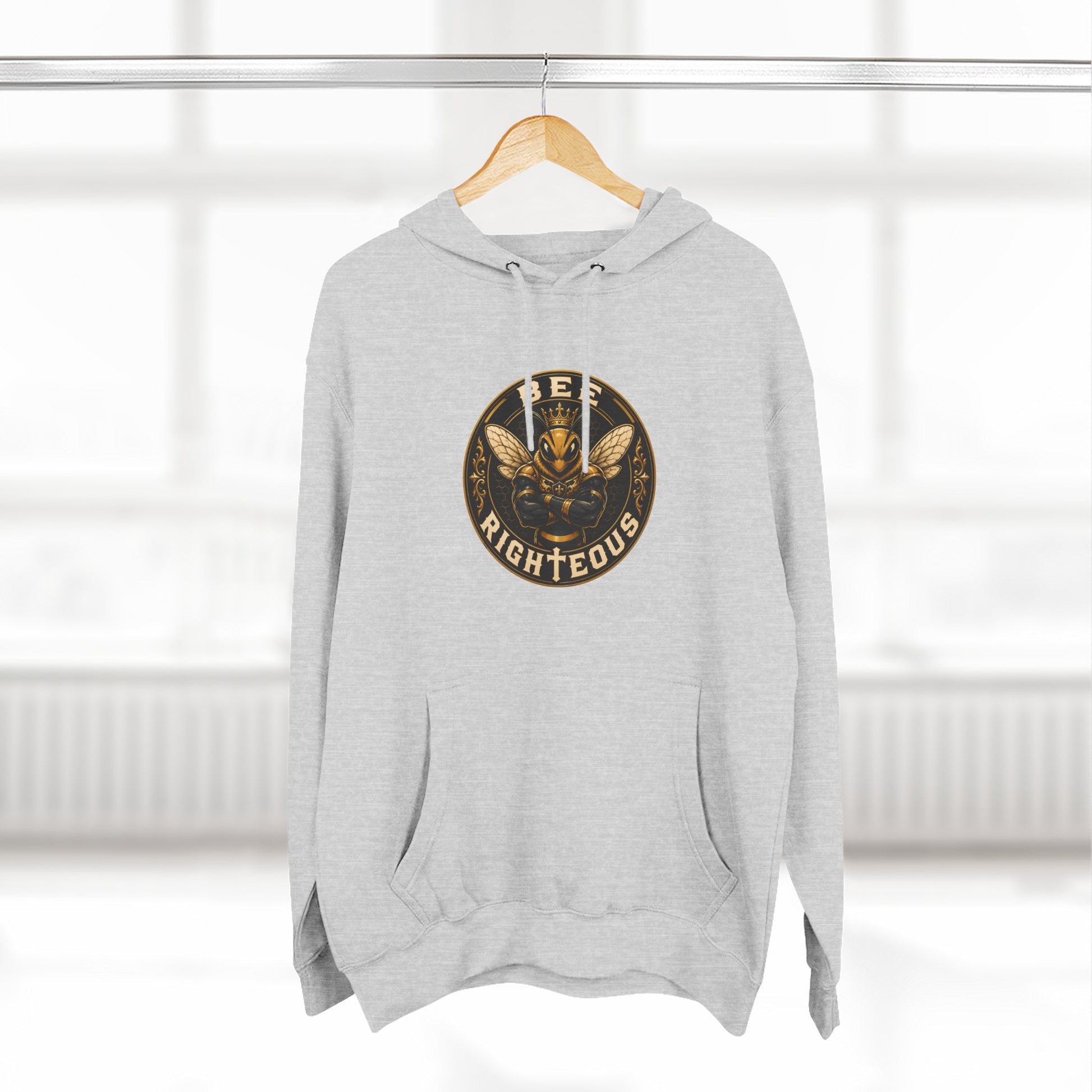 Gray hoodie with a logo on a hanger against a white background