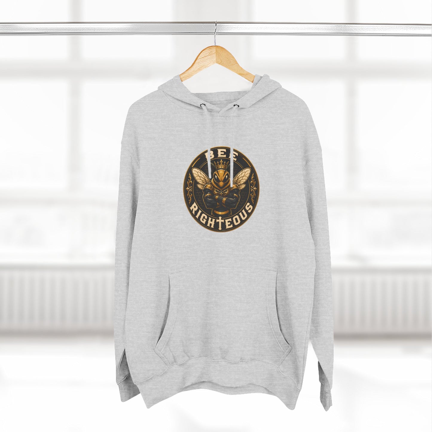 Gray hoodie with a logo on a hanger against a white background