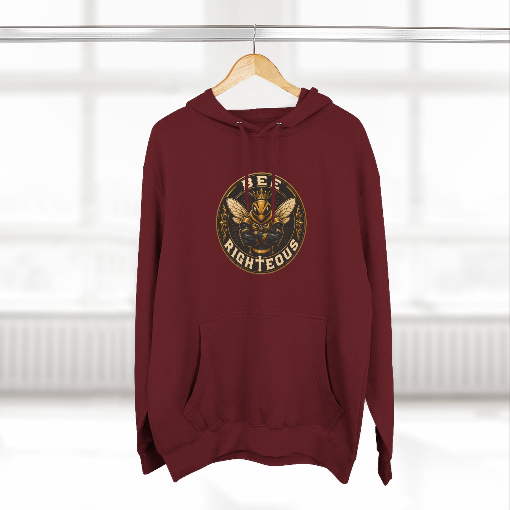 Green hoodie with 'League of Legends' text on a hanger against a white background
