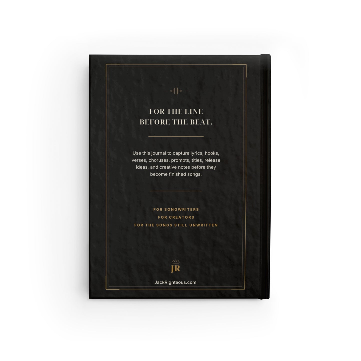 Black notebook with gold text on a white background