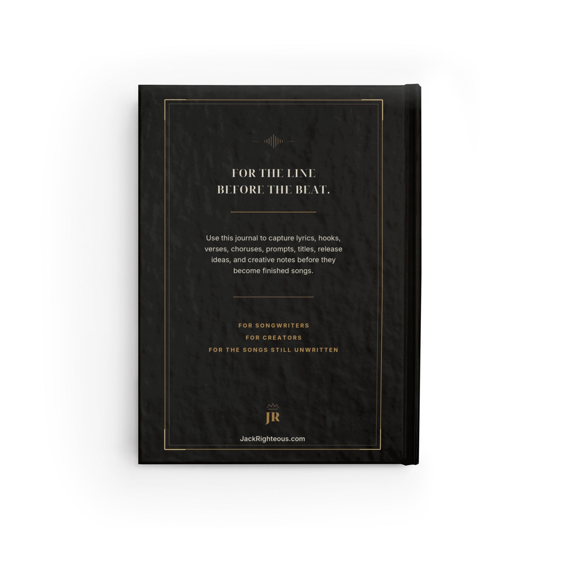 Black notebook with gold text on a white background