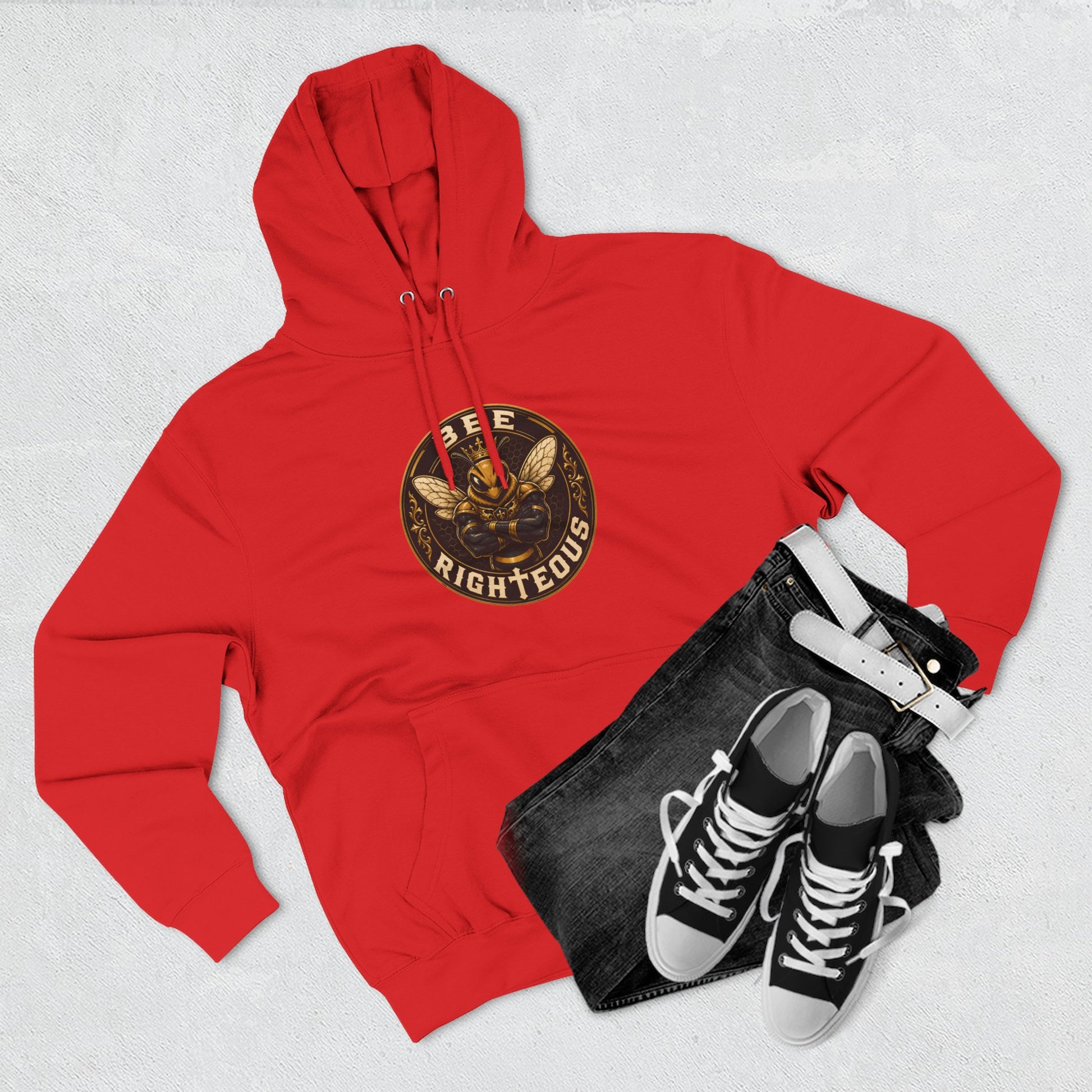 Red hoodie with 'The Terminator' graphic, black jeans, and black sneakers on a light gray background