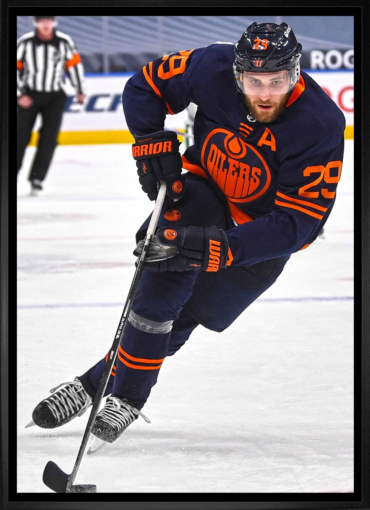 Leon Draisaitl Edmonton Oilers Framed 20x29 Skating with Puck Canvas - Jack Righteous